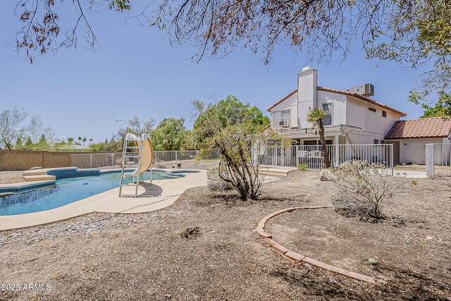 4627 E Mcneil St, Phoenix, AZ 85044 - view of swimming pool featuring a water slide, fence, a patio, and central AC