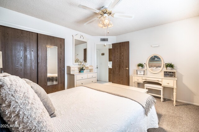 4501 E Carol Ave Unit 77, Mesa, AZ 85206 - carpeted bedroom with a ceiling fan, a closet, and baseboards