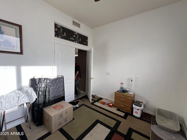 bedroom featuring visible vents