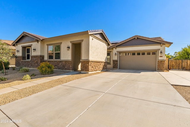 view of front of property featuring a garage