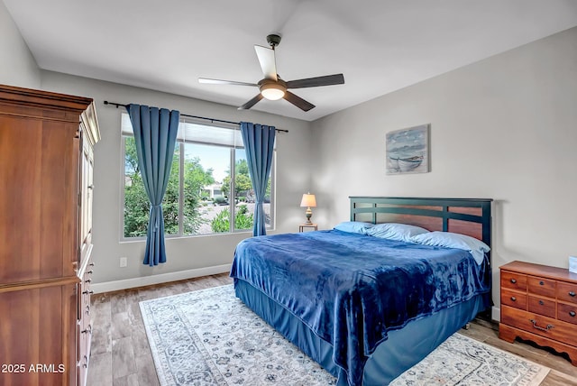 16426 W Piccadilly Rd, Goodyear, AZ 85395 - bedroom with wood finished floors and ceiling fan