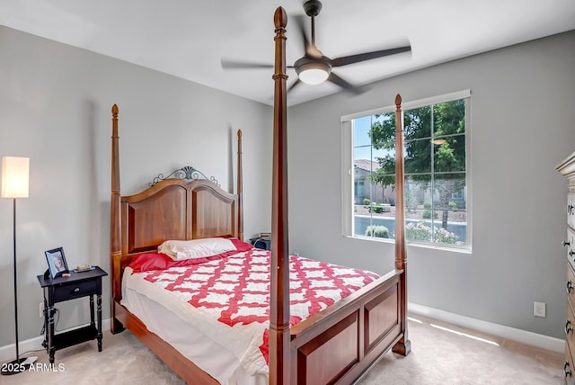 16426 W Piccadilly Rd, Goodyear, AZ 85395 - bedroom with light colored carpet and ceiling fan