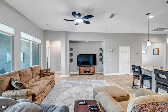 16426 W Piccadilly Rd, Goodyear, AZ 85395 - living area with ceiling fan, recessed lighting, and light tile patterned floors