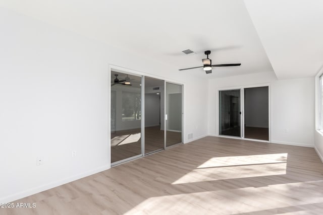 unfurnished bedroom featuring ceiling fan and light hardwood / wood-style flooring