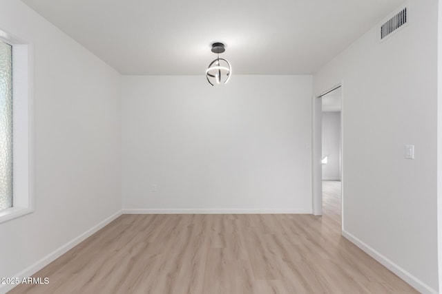 empty room featuring light hardwood / wood-style floors