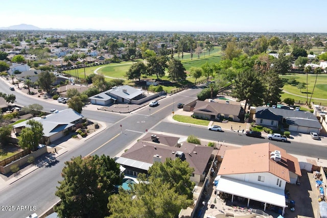 bird's eye view featuring view of golf course and a residential view
