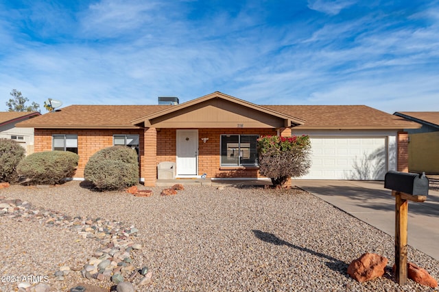 ranch-style house with a garage