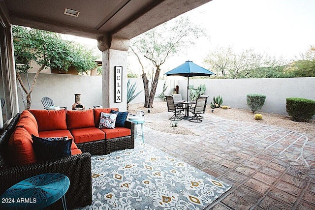 view of patio with outdoor lounge area