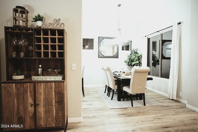 dining area featuring light hardwood / wood-style flooring