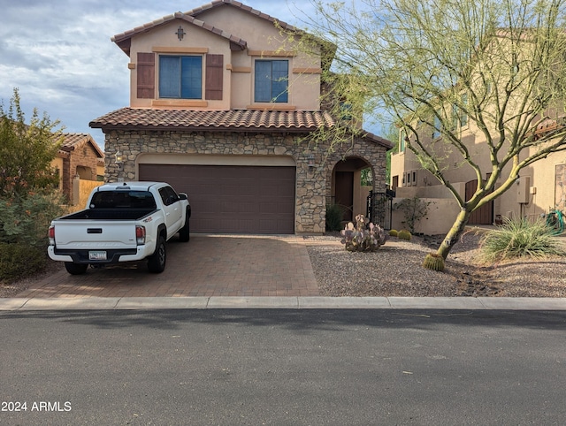 view of front of home with a garage