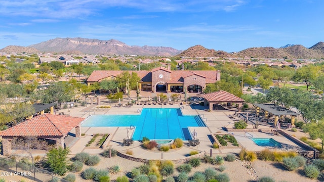 pool featuring a mountain view, a patio, a gazebo, and fence