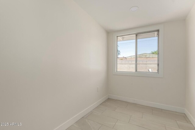 2240 W Cheery Lynn Rd, Phoenix, AZ 85015 - unfurnished room featuring light tile patterned flooring and baseboards