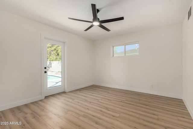 2240 W Cheery Lynn Rd, Phoenix, AZ 85015 - spare room with a wealth of natural light, light wood-type flooring, baseboards, and ceiling fan