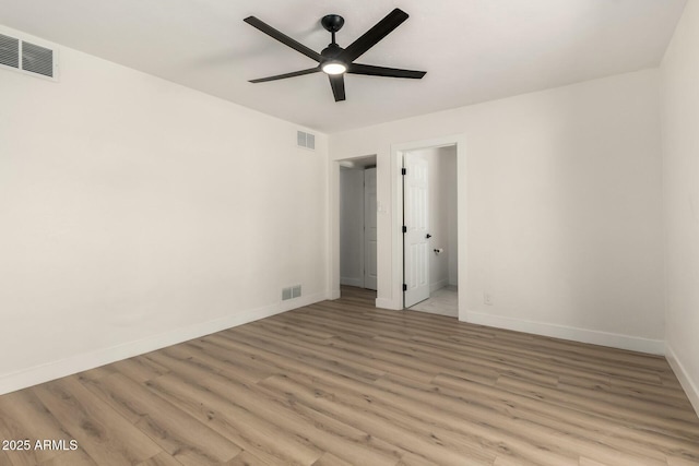 2240 W Cheery Lynn Rd, Phoenix, AZ 85015 - unfurnished bedroom with visible vents, light wood-type flooring, and baseboards