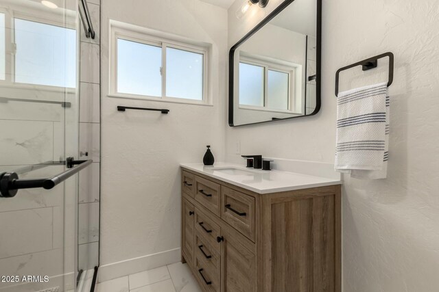 2240 W Cheery Lynn Rd, Phoenix, AZ 85015 - bathroom featuring a shower stall, vanity, marble finish floor, and baseboards
