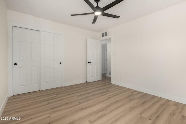 2240 W Cheery Lynn Rd, Phoenix, AZ 85015 - unfurnished bedroom featuring visible vents, baseboards, light wood finished floors, and a closet