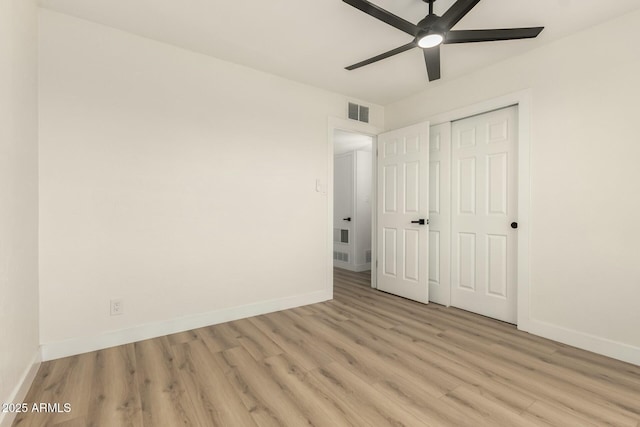 2240 W Cheery Lynn Rd, Phoenix, AZ 85015 - unfurnished bedroom featuring light wood finished floors, visible vents, and baseboards