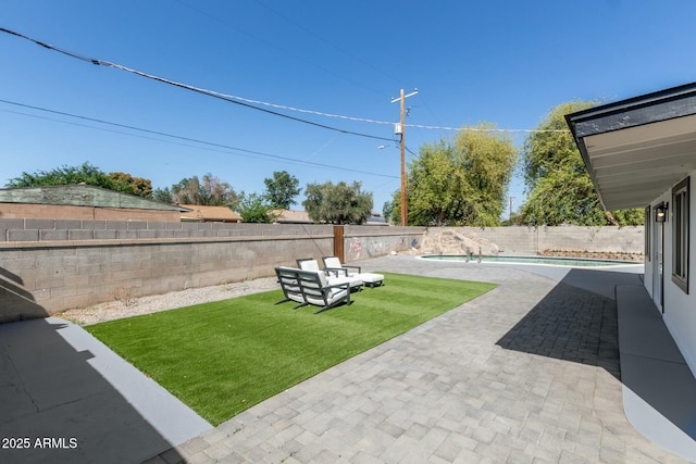 2240 W Cheery Lynn Rd, Phoenix, AZ 85015 - view of yard featuring a fenced backyard, a fenced in pool, and a patio