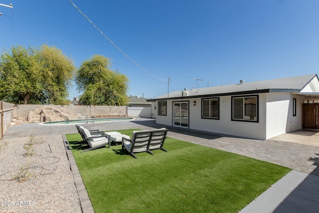 2240 W Cheery Lynn Rd, Phoenix, AZ 85015 - rear view of house featuring a patio, a fenced backyard, a fenced in pool, and a lawn