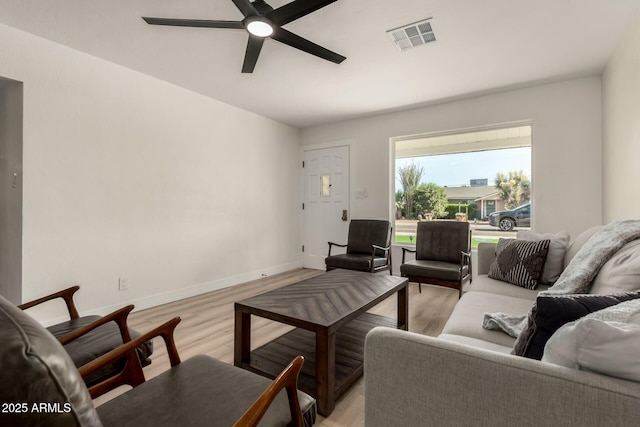 2240 W Cheery Lynn Rd, Phoenix, AZ 85015 - living area featuring visible vents, ceiling fan, light wood-type flooring, and baseboards