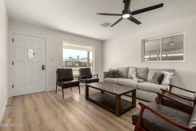 2240 W Cheery Lynn Rd, Phoenix, AZ 85015 - living area with visible vents, light wood finished floors, baseboards, and ceiling fan