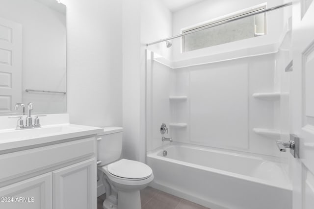 full bathroom featuring tile patterned floors, vanity, toilet, and tub / shower combination