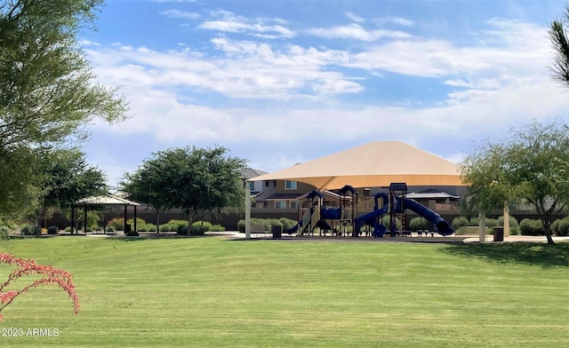 surrounding community with a gazebo, a lawn, and a playground