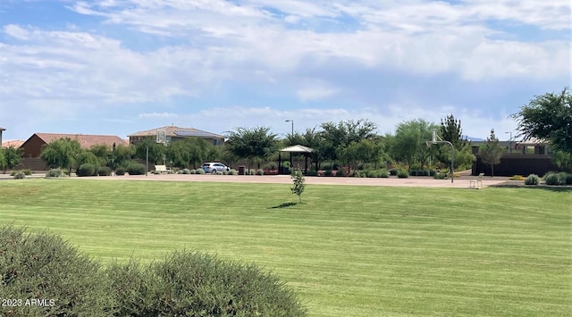 view of community with a gazebo and a yard