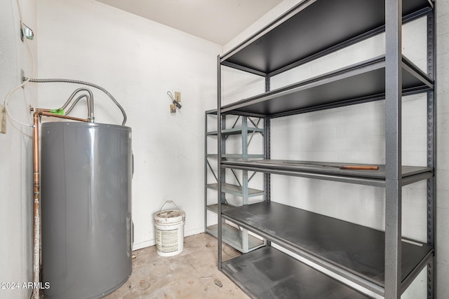 utility room with water heater