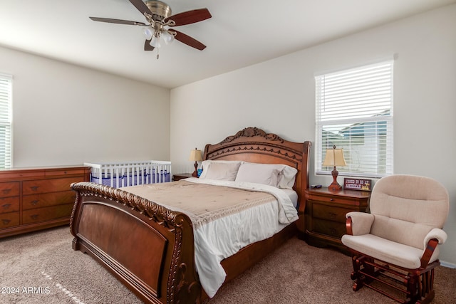 bedroom featuring ceiling fan and carpet flooring