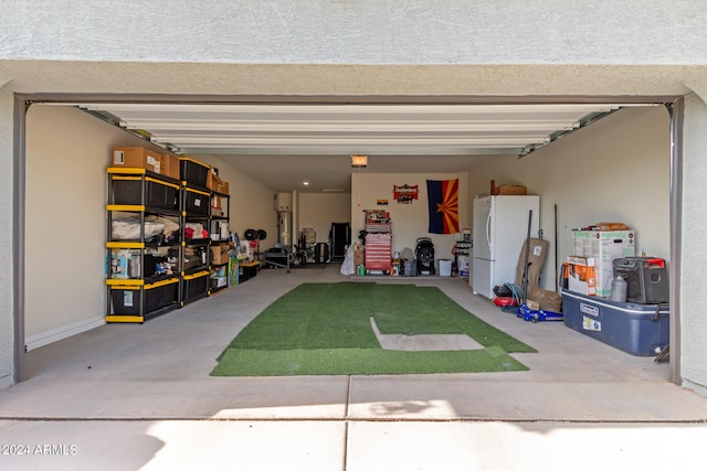 garage featuring white refrigerator