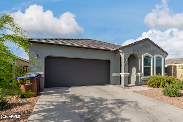 view of front of home with a garage