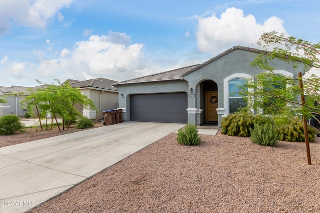 view of front of home with a garage