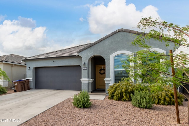 view of front of property featuring a garage