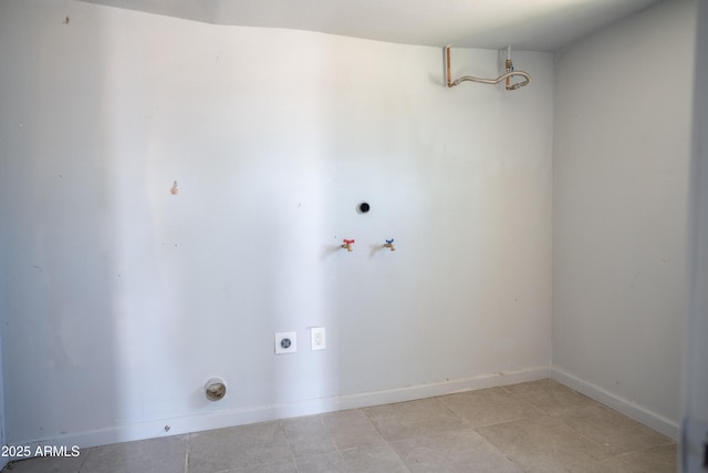 1410 S 24th Ave, Phoenix, AZ 85009 - clothes washing area with hookup for an electric dryer, light tile patterned floors, laundry area, hookup for a washing machine, and baseboards