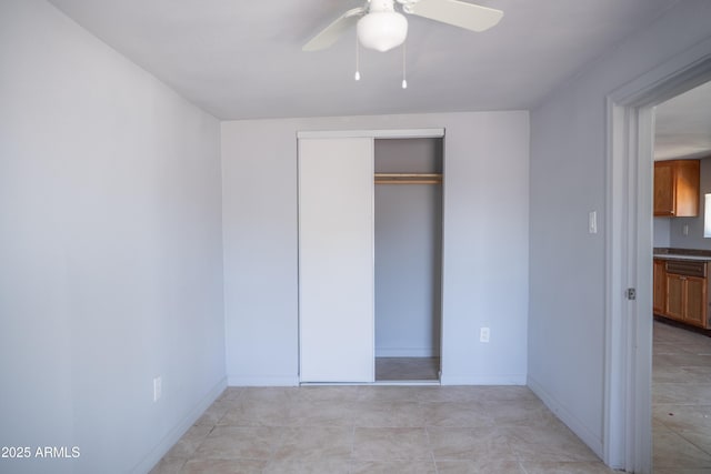 1410 S 24th Ave, Phoenix, AZ 85009 - unfurnished bedroom with ceiling fan, baseboards, and a closet