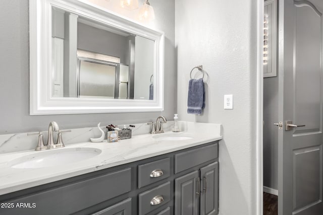 bathroom with double vanity and a sink