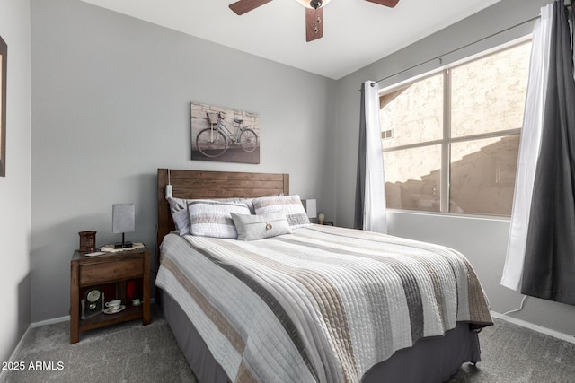 bedroom featuring carpet, a ceiling fan, and baseboards