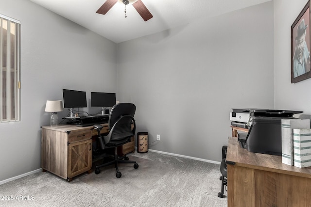 office with light carpet, baseboards, and a ceiling fan