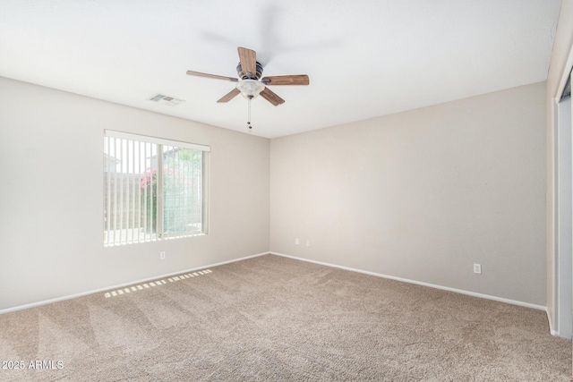2191 W Goldmine Mountain Dr, Queen Creek, AZ 85144 - spare room with carpet flooring, ceiling fan, and baseboards