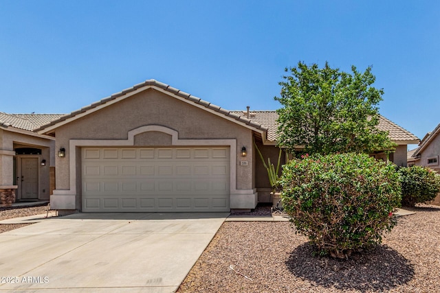 2191 W Goldmine Mountain Dr, Queen Creek, AZ 85144 - ranch-style house featuring an attached garage, stucco siding, and concrete driveway
