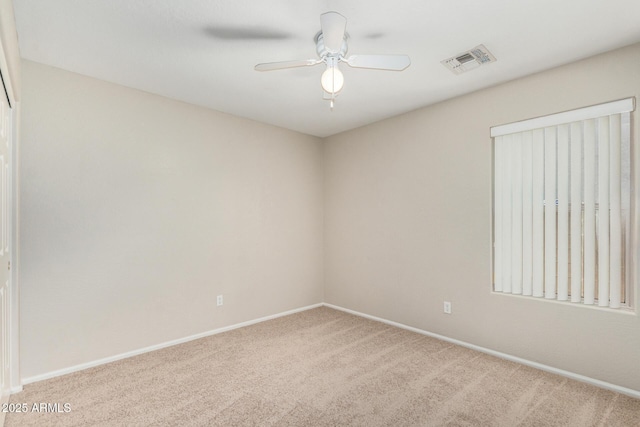 2191 W Goldmine Mountain Dr, Queen Creek, AZ 85144 - spare room with carpet, baseboards, and ceiling fan