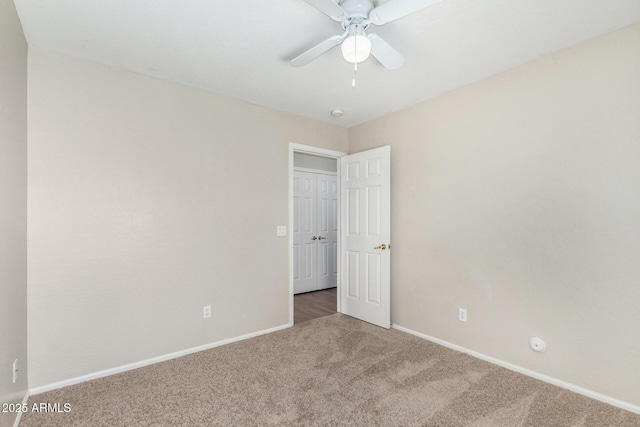 2191 W Goldmine Mountain Dr, Queen Creek, AZ 85144 - unfurnished room with carpet, ceiling fan, and baseboards