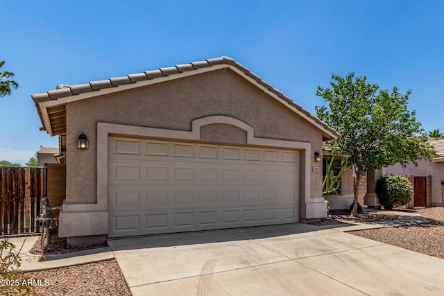 2191 W Goldmine Mountain Dr, Queen Creek, AZ 85144 - view of front of property with stucco siding, concrete driveway, fence, and an attached garage