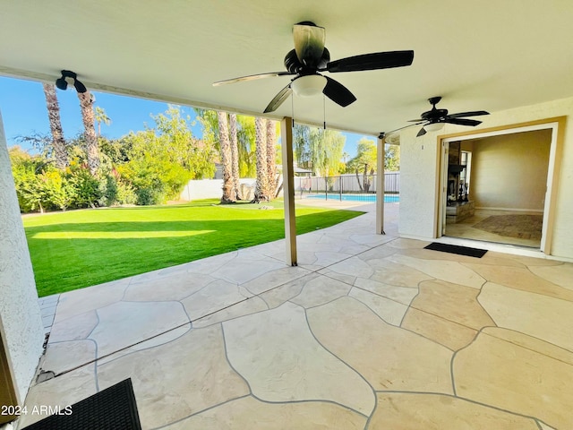 view of patio / terrace featuring ceiling fan