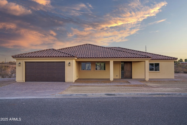 view of front of home with a garage