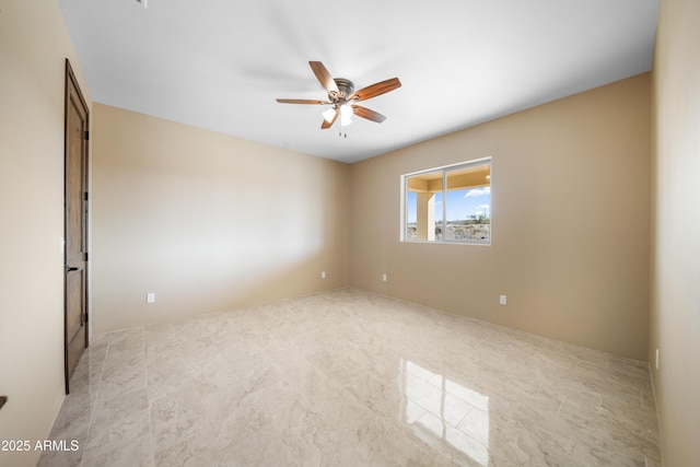 empty room featuring ceiling fan