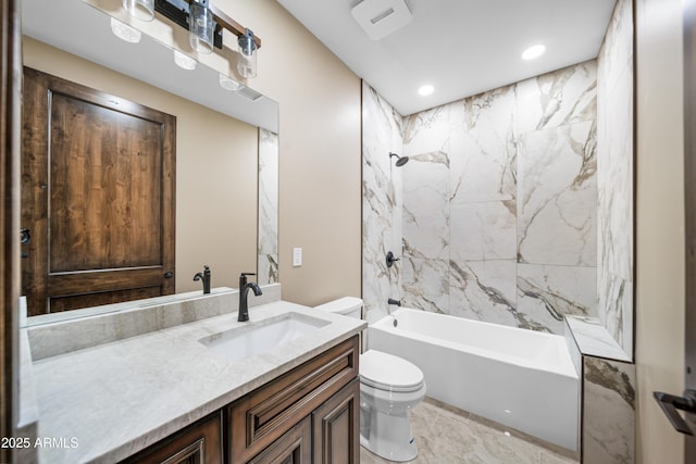 full bathroom with tiled shower / bath combo, toilet, and vanity