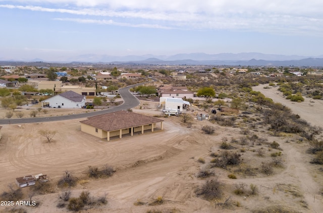 drone / aerial view featuring a mountain view