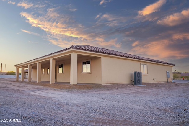 view of property exterior at dusk